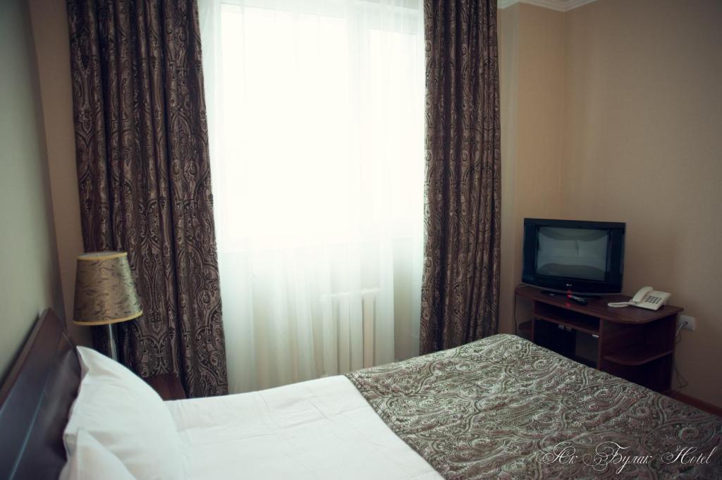 Akbulak Hotel Astana Phòng bức ảnh